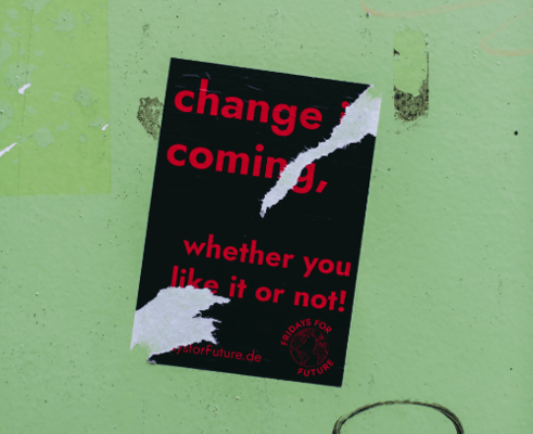 Flyer sticking on the wall about change